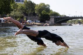 People Swimming In The Seine River - Paris