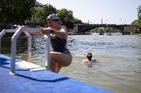 People Swimming In The Seine River - Paris