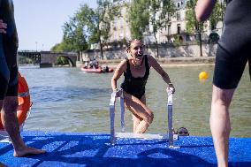 People Swimming In The Seine River - Paris