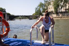 People Swimming In The Seine River - Paris