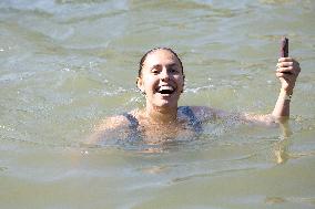 People Swimming In The Seine River - Paris