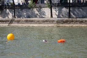 People Swimming In The Seine River - Paris