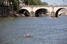 People Swimming In The Seine River - Paris