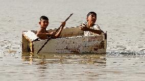 Iraqi Youth Swim Tigris River - Baghdad