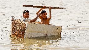 Iraqi Youth Swim Tigris River - Baghdad