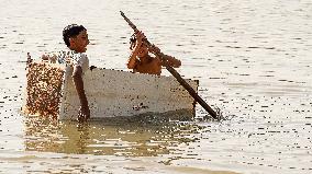 Iraqi Youth Swim Tigris River - Baghdad