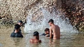 Iraqi Youth Swim Tigris River - Baghdad