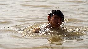 Iraqi Youth Swim Tigris River - Baghdad