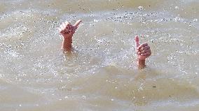 Iraqi Youth Swim Tigris River - Baghdad