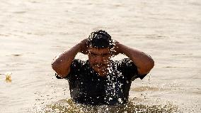 Iraqi Youth Swim Tigris River - Baghdad