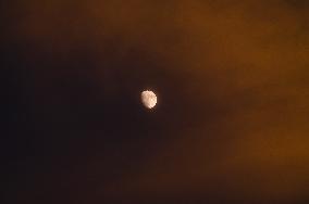 Waxing Gibbous Moon With Cumulus Clouds