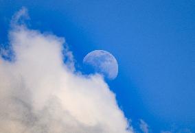 Waxing Gibbous Moon With Cumulus Clouds