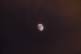 Waxing Gibbous Moon With Cumulus Clouds