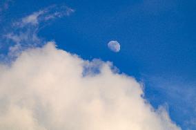 Waxing Gibbous Moon With Cumulus Clouds