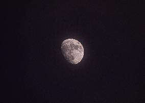 Waxing Gibbous Moon With Cumulus Clouds