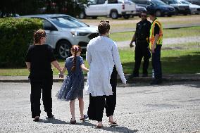 Mourners Arrive At Memorial For Corey Comperatore Who Was Killed At Trump Rally In Freeport Pennsylvania