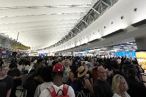 IT Outage Brings Airport Chaos - JFK