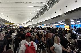 IT Outage Brings Airport Chaos - JFK