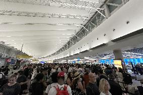 IT Outage Brings Airport Chaos - JFK