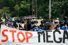 Large Mobilization Against The Mega-basins Near Poitiers And The Firing Of Tear Gas Started A Fire