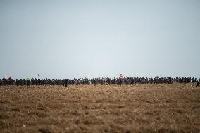 Large Mobilization Against The Mega-basins Near Poitiers And The Firing Of Tear Gas Started A Fire