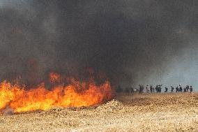 Large Mobilization Against The Mega-basins Near Poitiers And The Firing Of Tear Gas Started A Fire