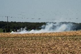 Large Mobilization Against The Mega-basins Near Poitiers And The Firing Of Tear Gas Started A Fire