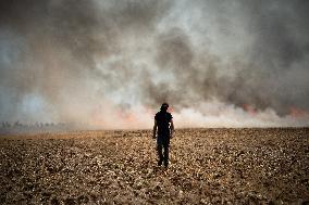 Large Mobilization Against The Mega-basins Near Poitiers And The Firing Of Tear Gas Started A Fire