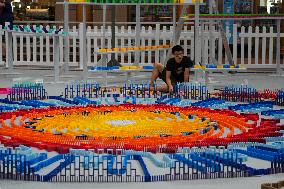 Domino Artist Lily Hevesh Prepares 100,000 Dominos In The National Building Museum For A Topple.