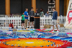 Domino Artist Lily Hevesh Prepares 100,000 Dominos In The National Building Museum For A Topple.