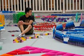 Domino Artist Lily Hevesh Prepares 100,000 Dominos In The National Building Museum For A Topple.