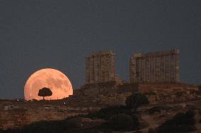 The Buck Full Moon Rises Over The Temple Of Poseidon In Sounio, Athens