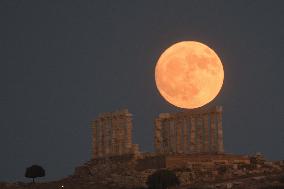 The Buck Full Moon Rises Over The Temple Of Poseidon In Sounio, Athens