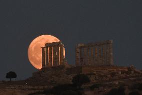 The Buck Full Moon Rises Over The Temple Of Poseidon In Sounio, Athens