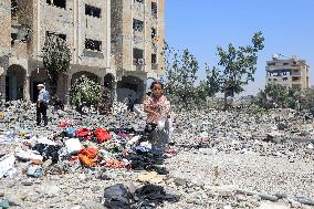 MIDEAST-GAZA-NUSEIRAT-AIRSTRIKE-AFTERMATH