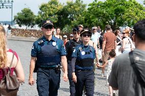 Paris 2024 - South Korean Police Officers Patrol In Montmartre