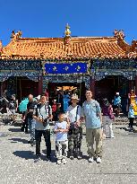 Tourists Visit Wuliang Temple in Hohhot