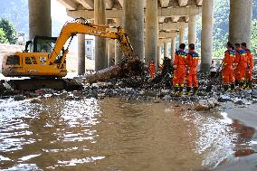 Rescue Operation After Bridge Collapse Amid Torrential Rains - China