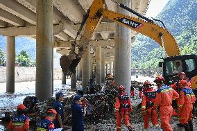 Rescue Operation After Bridge Collapse Amid Torrential Rains - China