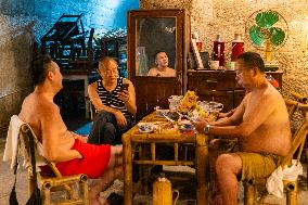 Residents at A Bomb Shelter to Cool Off in Chongqing