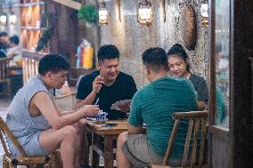 Residents at A Bomb Shelter to Cool Off in Chongqing