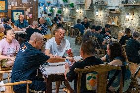 Residents at A Bomb Shelter to Cool Off in Chongqing