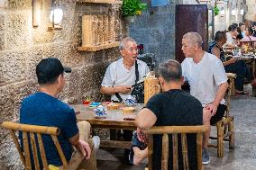 Residents at A Bomb Shelter to Cool Off in Chongqing