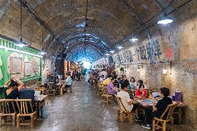 Residents at A Bomb Shelter to Cool Off in Chongqing