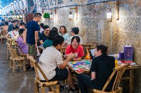 Residents at A Bomb Shelter to Cool Off in Chongqing