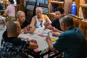 Residents at A Bomb Shelter to Cool Off in Chongqing