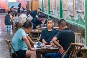 Residents at A Bomb Shelter to Cool Off in Chongqing