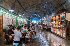 Residents at A Bomb Shelter to Cool Off in Chongqing