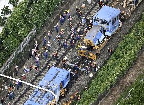 Shinkansen services disrupted due to maintain vehicle derailment