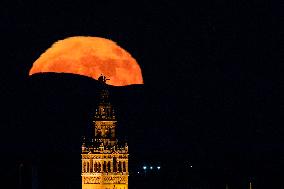 Full Moon Rises Behind The Cathedral - Seville